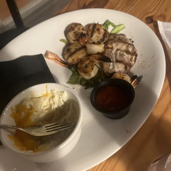 Down Under Restaurant - Seafood platter. $32 for this. 3 shrimp, 3 scallops and a slice of fish. - Seafood Near Me - Fernandina Beach, Florida