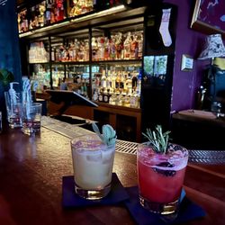 MiniBar Miami - BEACH IN MEXICO on left, and non-alcohol version of MINI BRAMBLE on right, with bar area.
