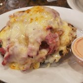 Photo of Max's Delicatessen & Restaurant - Highland Park, IL, United States. Ruben Corned beef, sauerkraut, Swiss, Russian dressing, marble rye