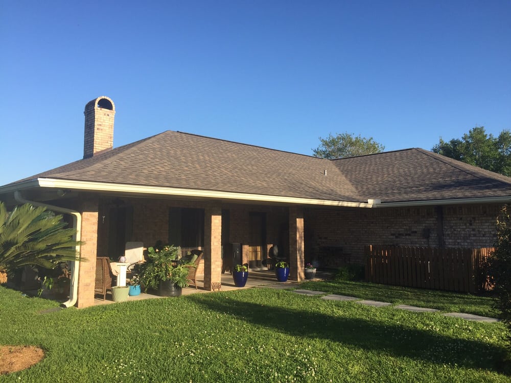 Slide of Ford Roofing Service