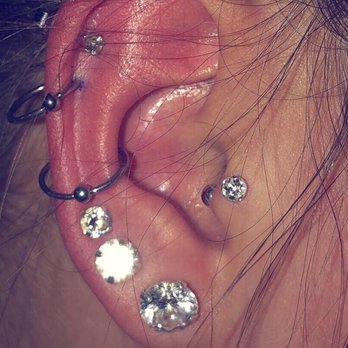 Trigger Happy Tattoo - conch + lower cartilage - Tattoo Near Me - La Habra, California Trigger Happy Tattoo - conch + lower cartilage - Tattoo Near Me - La Habra, California