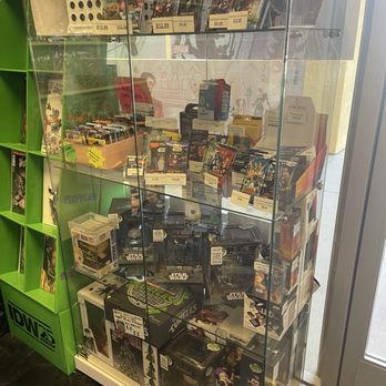 Rated Comics - Small trading card tower with tons of collectibles for sale - Comic Books Near Me - Palm Springs, California