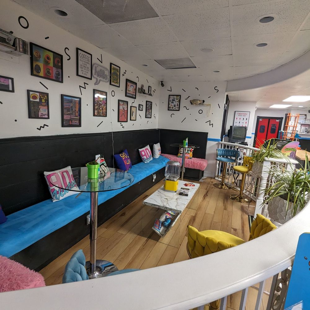 Nostalgia NOLA - Plenty of seating for families or friends coming to vibe out in the 80s/90s - Coffee & Tea Near Me - New Orleans, Louisiana Nostalgia NOLA - Plenty of seating for families or friends coming to vibe out in the 80s/90s - Coffee & Tea Near Me - New Orleans, Louisiana