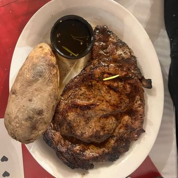 Beechwood Restaurant & Lounge - 10-12oz rib-eye medium well, baked potato only butter!! - Bars Near Me - Vicksburg, Mississippi Beechwood Restaurant & Lounge - 10-12oz rib-eye medium well, baked potato only butter!! - Bars Near Me - Vicksburg, Mississippi