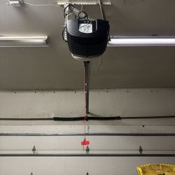 The Traveling Remedy - Old garage door and opener