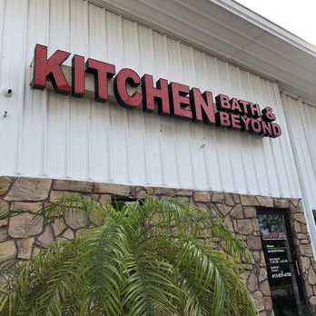 Kitchen Bath & Beyond - Behind this unassuming sign is some beautiful kitchens to be built - Flooring Near Me - Tampa, Florida