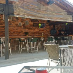 Marine Street Grill - The other side of the patio. The bar is behind that wall.