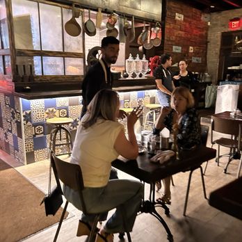 FINKA Table & Tap - Gabriela, in the back in black not attending to her station! The food is amazing but the hostess needs to change!! - Asian Fusion Near Me - Miami, Florida FINKA Table & Tap - Gabriela, in the back in black not attending to her station! The food is amazing but the hostess needs to change!! - Asian Fusion Near Me - Miami, Florida