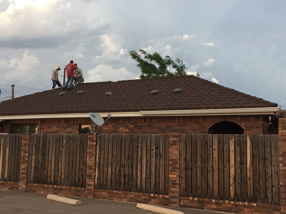 Slide of Hartman Roofing