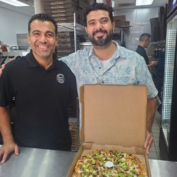 Pizza Guys - Extremely freindly guys. Nader is on the right and very personal. The pizza looks very delicious! - Pizza Near Me - Brea, California Pizza Guys - Extremely freindly guys. Nader is on the right and very personal. The pizza looks very delicious! - Pizza Near Me - Brea, California