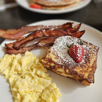 Sweet E's Cafe - The perfect breakfast. One banana and cream cheese stuffed French Toast, Scrambled Eggs, and Bacon - Cafes Near Me - Honolulu, Hawaii Sweet E's Cafe - The perfect breakfast. One banana and cream cheese stuffed French Toast, Scrambled Eggs, and Bacon - Cafes Near Me - Honolulu, Hawaii
