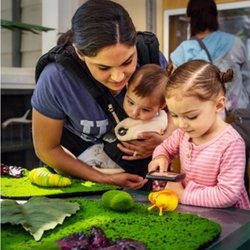 Kidspace Children's Museum - Learning about caterpillars in Nature Exchange