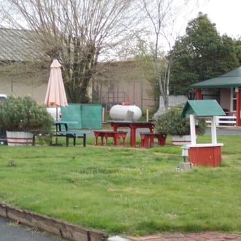 Jumping Frog Motel - Rear of motel grassy area - Hotels Near Me - Angels Camp, California Jumping Frog Motel - Rear of motel grassy area - Hotels Near Me - Angels Camp, California