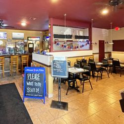 Junior & Rosie's Neighborhood Cafe & Grille - Dining area to the right