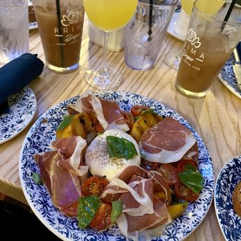 Prima Dopo - Burrata with grilled peaches, tomatoes, and prosciutto - Italian Near Me - Baltimore, Maryland
