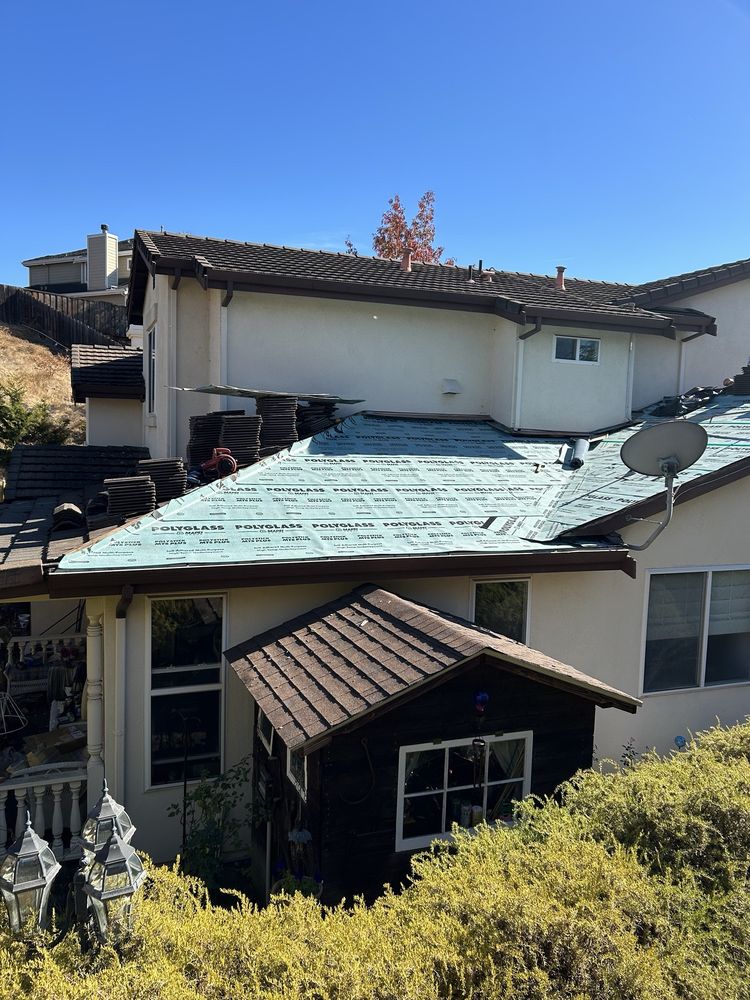 Slide of Diamond Ridge Roofing Systems