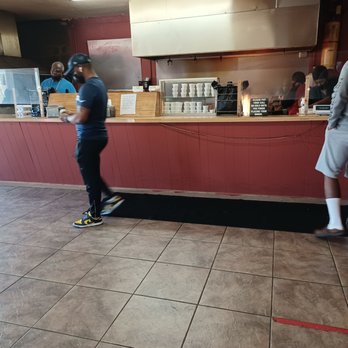 E & L Barbeque - a man on a skateboard - Barbeque Near Me - Jackson, Mississippi