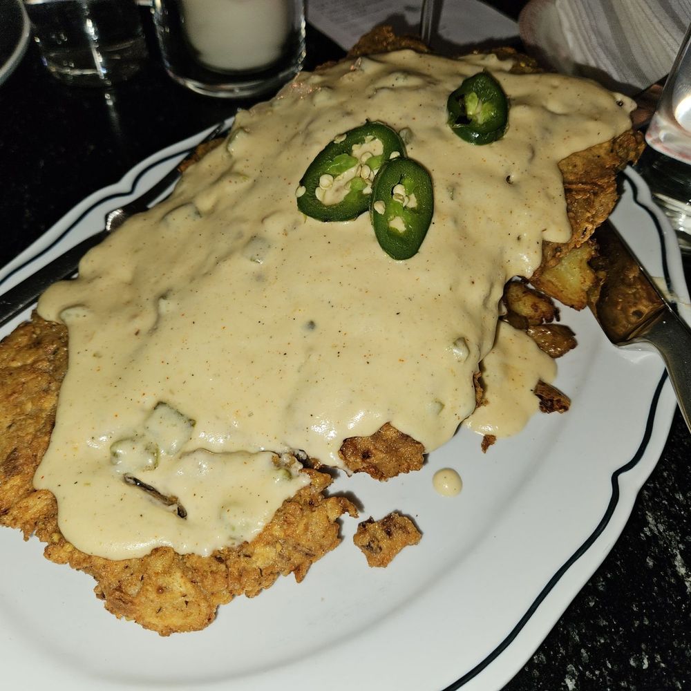 Marfa Texas Kitchen - Pistachio crusted Chicken fried steak with Jalapeño gravy - New American Near Me - College Station, Texas Marfa Texas Kitchen - Pistachio crusted Chicken fried steak with Jalapeño gravy - New American Near Me - College Station, Texas