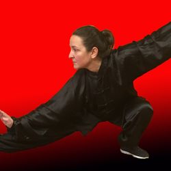 Black Mountain Spirit School of Chinese Kung Fu - Mira performs a most elegant Snake Creeps Down technique from the Yang Family TaiJiQuan system of Kung Fu.