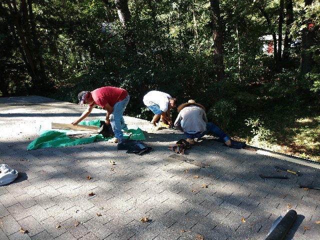 Slide of Koch Brothers Roofing