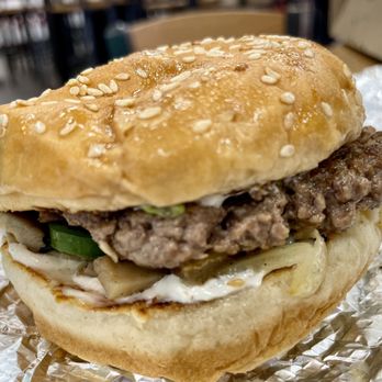Five Guys - a hamburger sitting on tin foil - Burgers Near Me - New Albany, Indiana Five Guys - a hamburger sitting on tin foil - Burgers Near Me - New Albany, Indiana