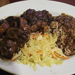 Exclusive Jerk Restaurant & Bar - Dinner Oxtail red beans ans rice cabbage
