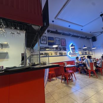 El Desembarco - Left hand side Seating area, there's the right side and the behind me that has seating area - Burgers Near Me - Miami Beach, Florida El Desembarco - Left hand side Seating area, there's the right side and the behind me that has seating area - Burgers Near Me - Miami Beach, Florida
