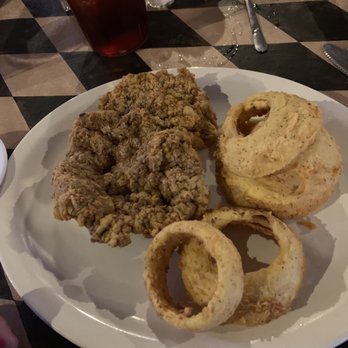 Murphy's Steakhouse - My small chicken fried steak and awesome onion rings! - Steakhouses Near Me - Winchester, Texas