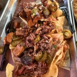 Is loaded brisket and sausage nachos