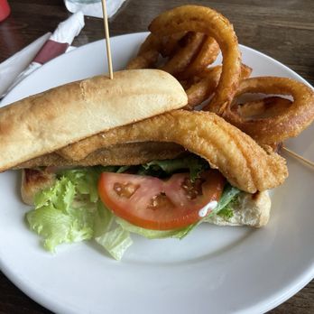 The Dock at Bayview - Perch sandwich with onion rings - Bars Near Me - Richland, Michigan The Dock at Bayview - Perch sandwich with onion rings - Bars Near Me - Richland, Michigan