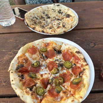The Outrigger Pizza Company - White cheddar mushroom (top) and pepperoni, mushroom, jalapeno (bottom) - Pizza Near Me - Kihei, Hawaii The Outrigger Pizza Company - White cheddar mushroom (top) and pepperoni, mushroom, jalapeno (bottom) - Pizza Near Me - Kihei, Hawaii