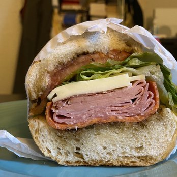Ottomanelli Butcher Shoppe - a sandwich on a plate - Meat Shops Near Me - New York, New York Ottomanelli Butcher Shoppe - a sandwich on a plate - Meat Shops Near Me - New York, New York