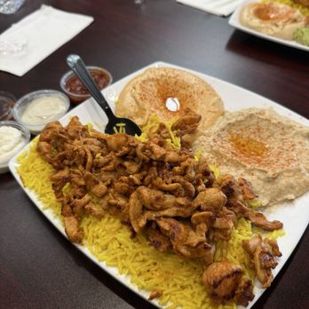 Pita Feast - Chicken Shawarma Plate with Babaganoush and Spicy Hummus - Mediterranean Near Me - Huntington Beach, California Pita Feast - Chicken Shawarma Plate with Babaganoush and Spicy Hummus - Mediterranean Near Me - Huntington Beach, California