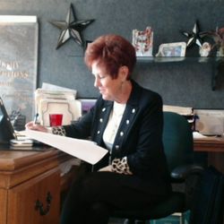 Healthy Connections by Joanie - Joanie on her iPad conducting one of many daily FaceTime/Messenger consultations.