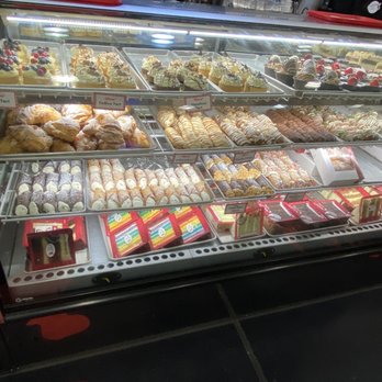 Carlo's Bakery - Inside--cannoli, cookie, and other treats counter - Bakeries Near Me - Hoboken, New Jersey