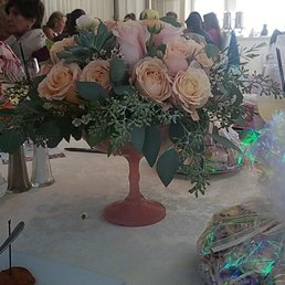 The flower arrangement for my daughter's bridal shower could it of been more Romantic they we beautiful !!!!