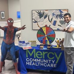 Mercy Community Healthcare - Back to school backpack giveaway with a wild check visit