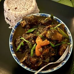 The oxtail with rice and peas