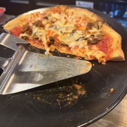 Tomato sauce was velvety and just right. Sausage spicy like I like it. Crust chewy and just right char.