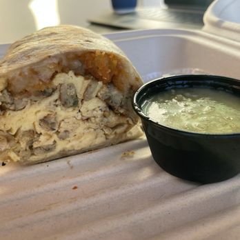 Sugar Beats - 1/2 a breakfast burrito. Green sauce. - Breakfast & Brunch Near Me - Oxnard, California