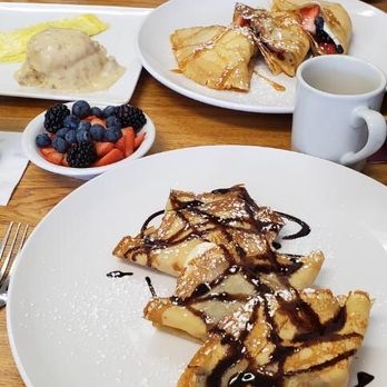 Manny's Cafe - Banana Nutella Crepes, Very Berry Crepes, 1/2 order of biscuits and gravy with 2 scrambled eggs and a bowl of fruit. - Breakfast & Brunch Near Me - Carol Stream, Illinois
