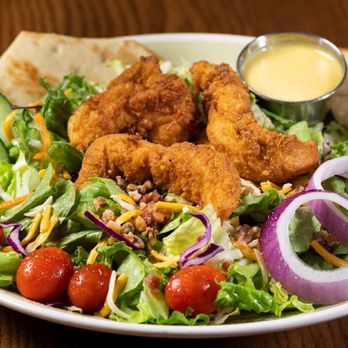 99 Restaurants - a plate of food with a salad - American Near Me - Woburn, Massachusetts