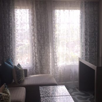 Wyndham Grand Jupiter at Harbourside Place - Living room - Hotels Near Me - Jupiter, Florida