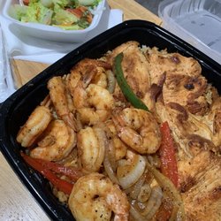 Linden Square BBQ - Grilled chicken breast and Shrimp with rice and beans. Side salad. Yummy!