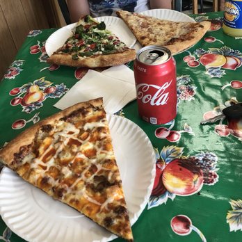 Roberto's Pizzeria - two slices of pizza and a can of soda - Pizza Near Me - Greenfield, Massachusetts