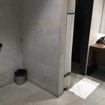 The Centurion Lounge - Shower and commode in shower room - Airport Lounges Near Me - Dallas, Texas