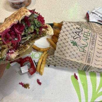 Sababa Falafel Shop - Falafel Pita and fries (side order chicken for protein lovers) - Falafel Near Me - Garden Grove, California Sababa Falafel Shop - Falafel Pita and fries (side order chicken for protein lovers) - Falafel Near Me - Garden Grove, California