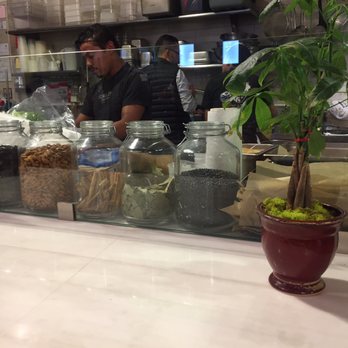 Corazon Cocina - This could be my kitchen! Love the spices in jars on the counter. - Mexican Near Me - Santa Barbara, California