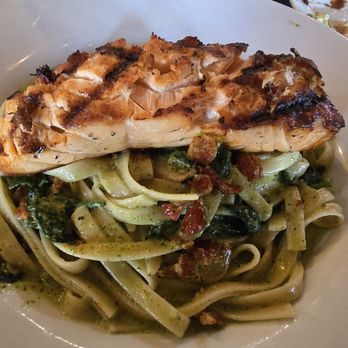 Romano's Macaroni Grill - Create your own pasta: Pesto Fettucini with spinach and sun dried tomatoes. And,added Grilled Salmon for some protein. - Italian Near Me - Milpitas, California Romano's Macaroni Grill - Create your own pasta: Pesto Fettucini with spinach and sun dried tomatoes. And,added Grilled Salmon for some protein. - Italian Near Me - Milpitas, California