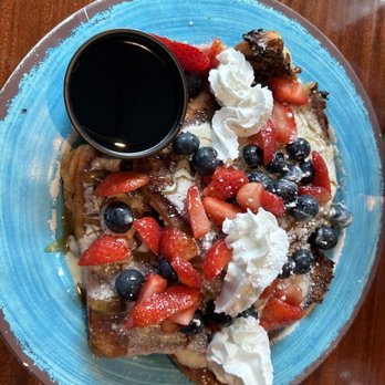Clear Sky Cafe - Cinnamon Bun French Toast with fresh berries - New American Near Me - Clearwater, Florida